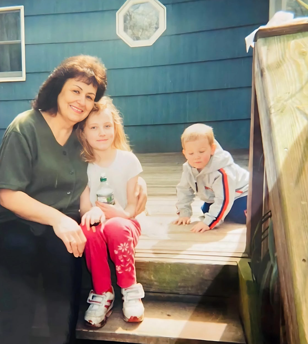 Mom with Katie and MJ on her back porch